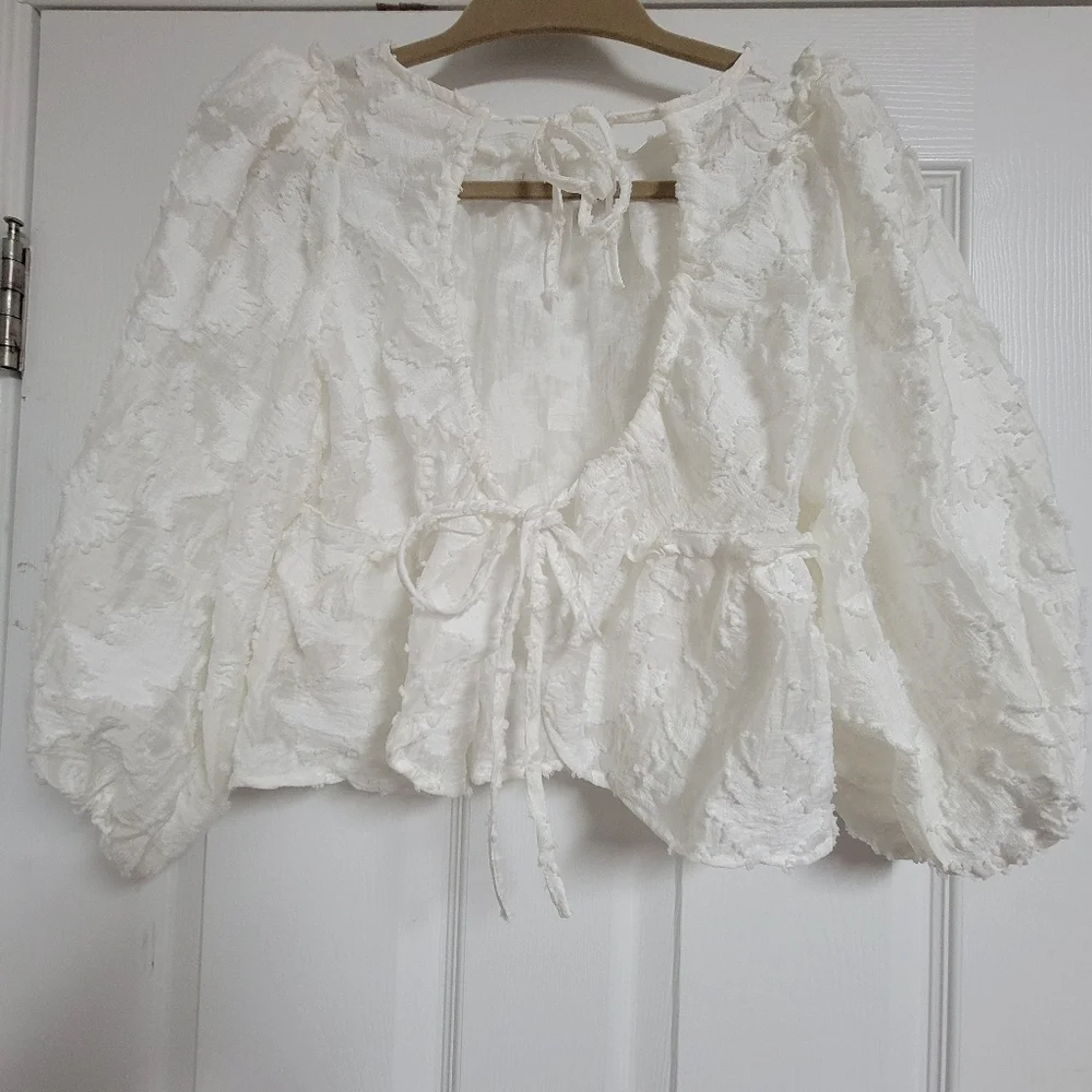 Free People Callie White Floral Aplique Peplum Blouse Tie Back Puff Sleeve.